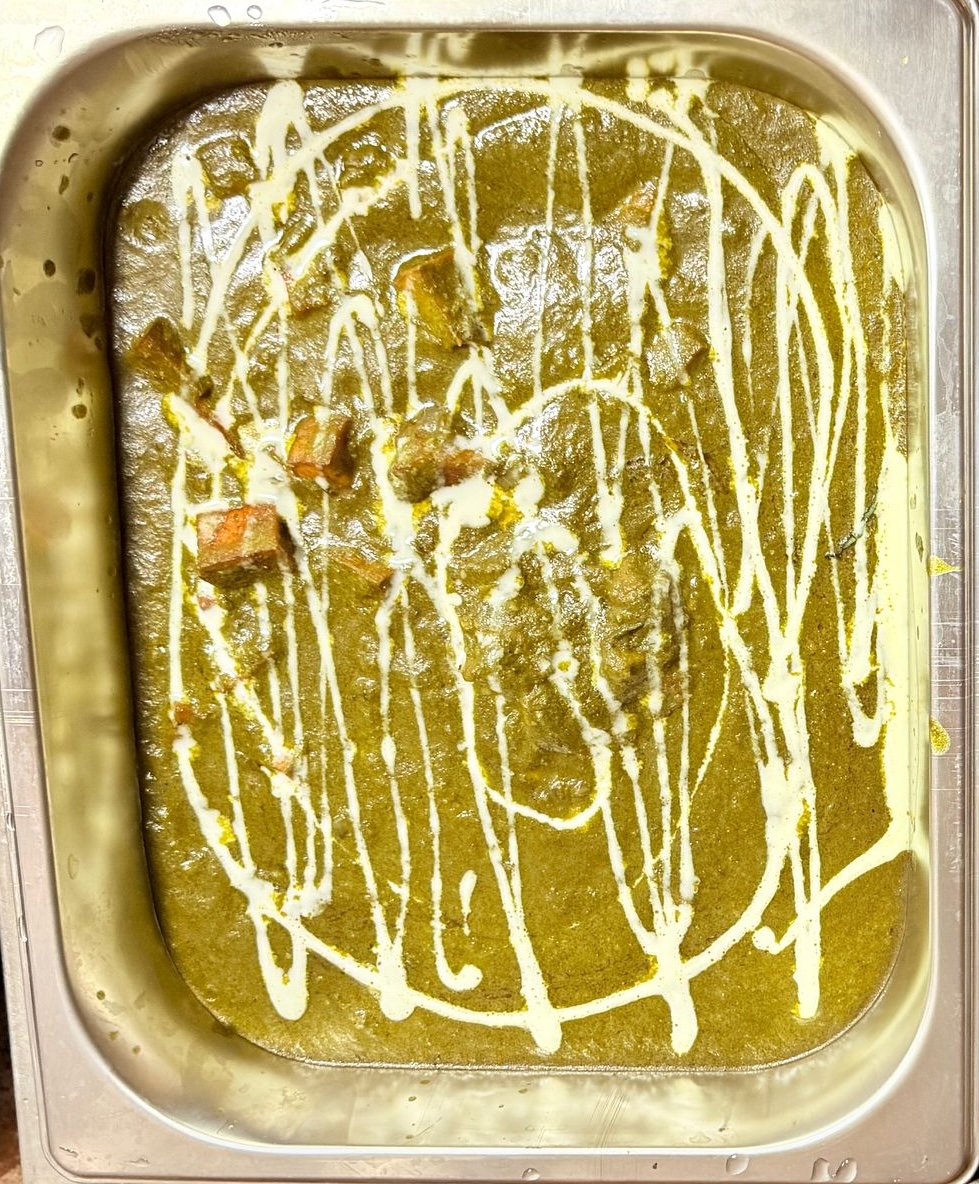 Catering tray with curries and rice